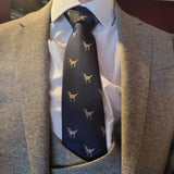 Navy blue tie embroidered with T-rex dinosaur