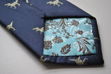 Navy blue tie embroidered with T-rex dinosaur